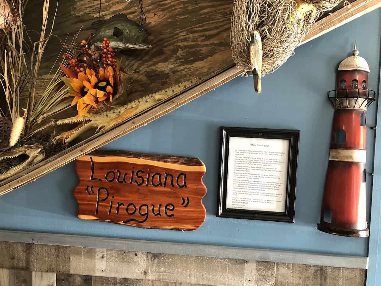 Pirogue on the wall at Paw Paw's