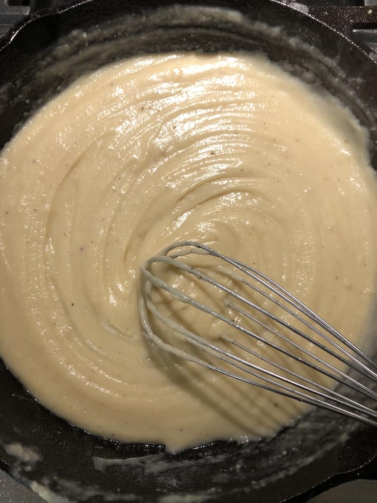 making gravy in a cast iron skillet