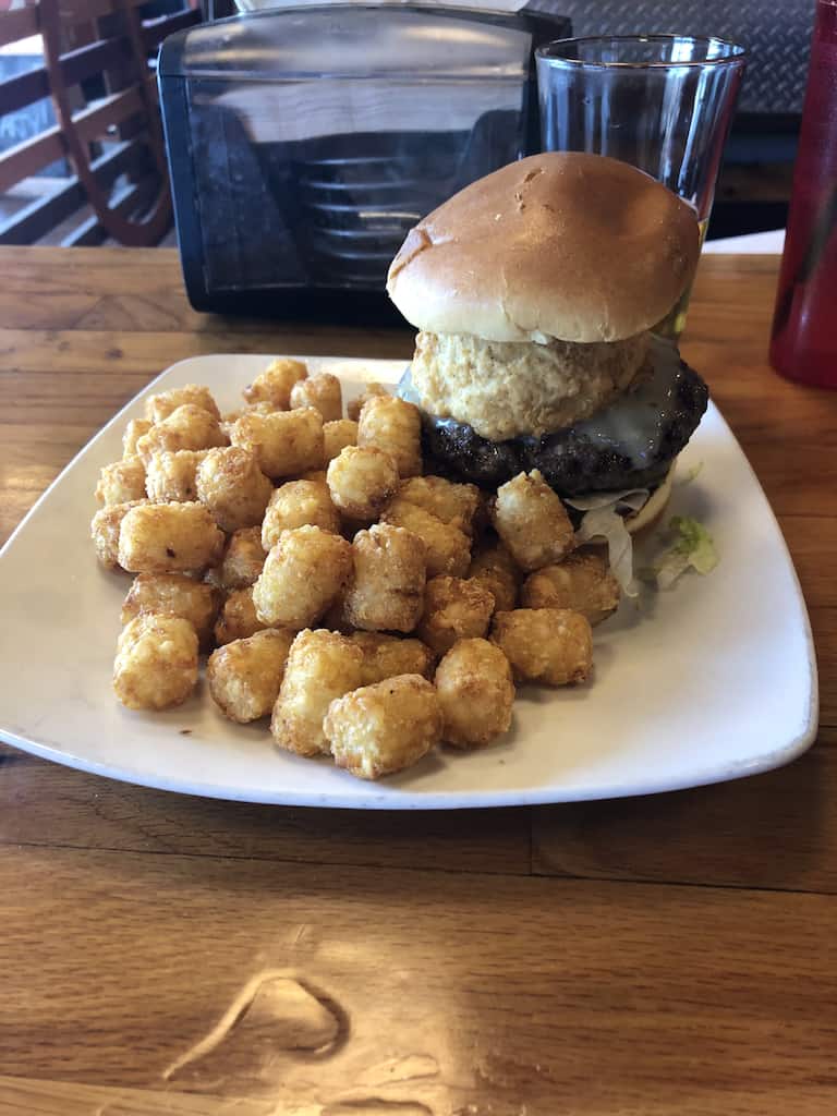 Bluffs Grill and Tap burger with tots
